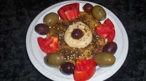 Manaeesh Appetizer with Tomatoes, Olives and Hummus Manaeesh Appetizer with Tomatoes and Hummus